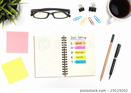 Smart goal setting with office supply over desk Smart goal setting with office supply over desk 29129202