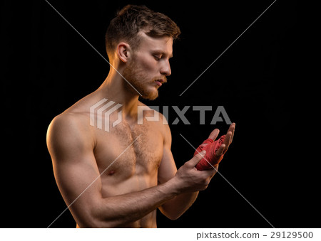 Young fighter man with boxing bandages Young fighter man with boxing bandages 29129500