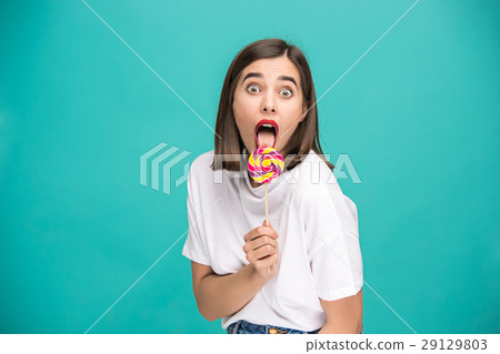 The young woman with colorful lollipop The young woman with colorful lollipop 29129803