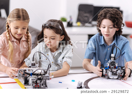 Inventive children testing technologies at school Inventive children testing technologies at school 29129872