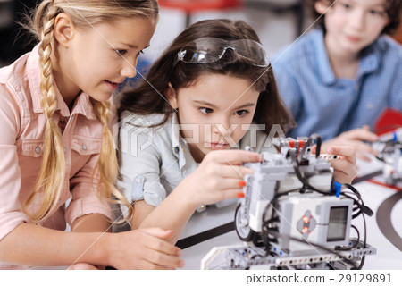 Involved children discussing project at school 29129891