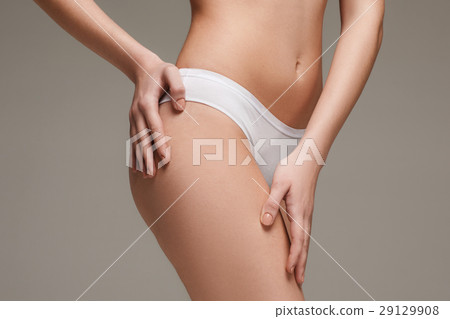 Young, slim, healthy and beautiful woman in white Young, slim, healthy and beautiful woman in white 29129908