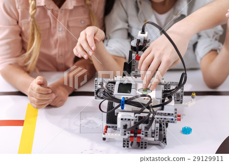 Skillful children testing robot at school Skillful children testing robot at school 29129911