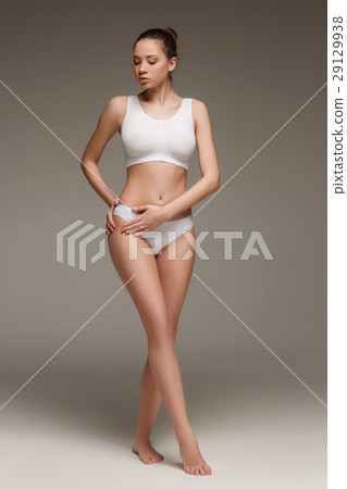 Young, slim, healthy and beautiful woman in white 29129938