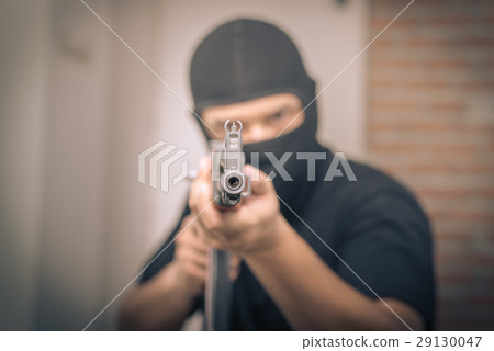 Terrorist sniper shooting with his weapon Terrorist sniper shooting with his weapon 29130047