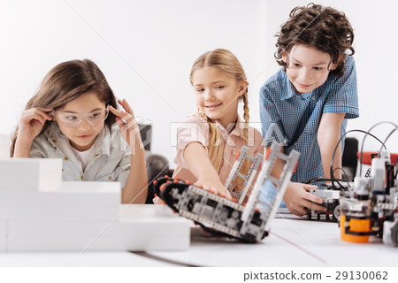 Inspired kids testing cyber robots at school 29130062