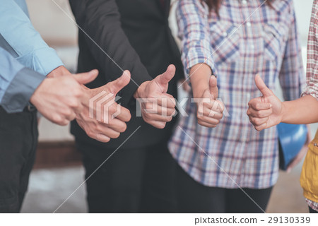 Thumb up of collaboration teamwork concept 29130339