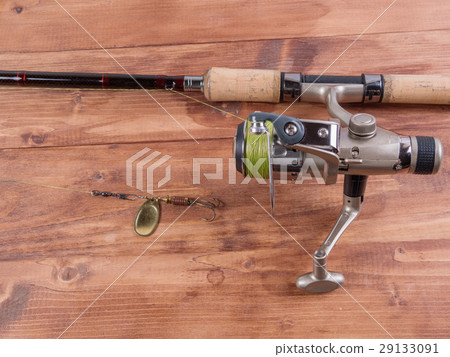 Spinning, baubles on a wooden background. 29133091