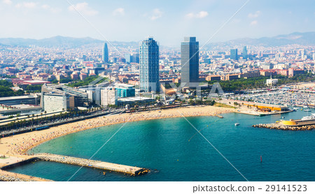 Summer beach with many people resting at Barcelona seaside Summer beach with many people resting at Barcelona seaside 29141523