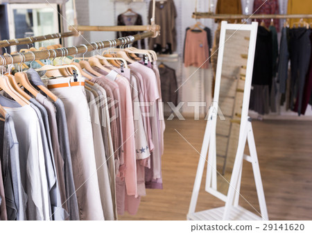Knitted clothing on hangers in garment store Knitted clothing on hangers in garment store 29141620