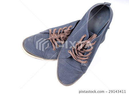 A pair of walking blue sneakers isolated  29143411