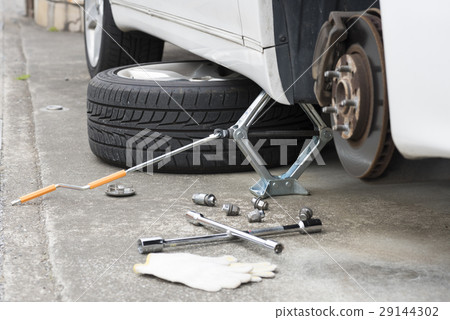 Car tire replacement work Car tire replacement work 29144302