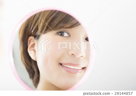 Beauty Young woman Image staring with holding a hand mirror Beauty Young woman Image staring with holding a hand mirror 29144857