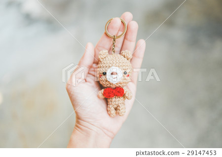 The bear doll in hand 29147453