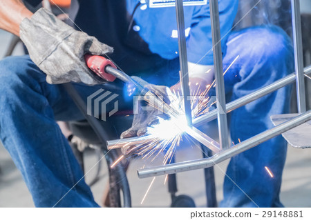 Making sure he's protected while welding 29148881