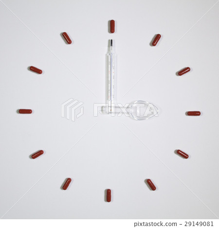 Clock of twelve pills, medical thermometer Clock of twelve pills, medical thermometer 29149081