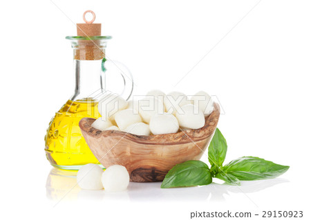 Mozzarella cheese, olive oil and basil 29150923