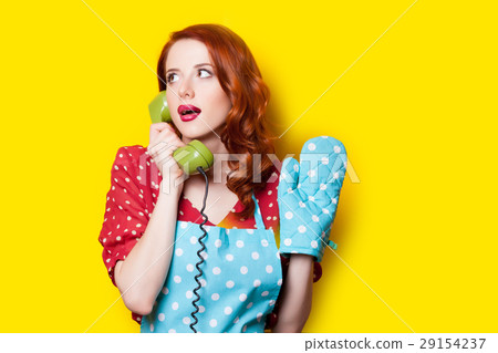 beautiful young woman with retro phone 29154237