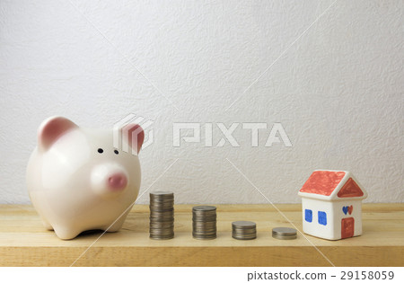 piggy bank with house and coins 29158059