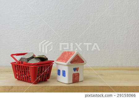 coins in a basket red and House model  29158066