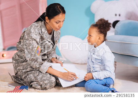 Two pretty smart ladies studying together Two pretty smart ladies studying together 29158135