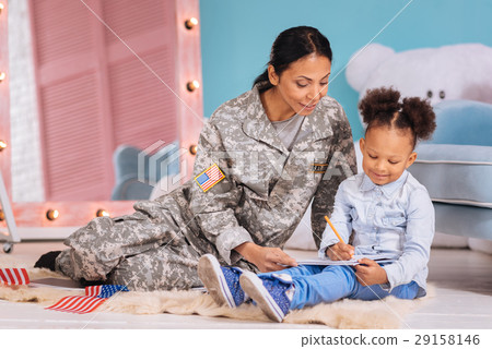 Lively patriotic family working on inspiring essay 29158146