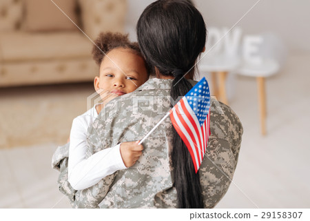 Emotional child really happy seeing her mother Emotional child really happy seeing her mother 29158307