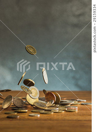 The silver and golden coins and falling coins on 29159334