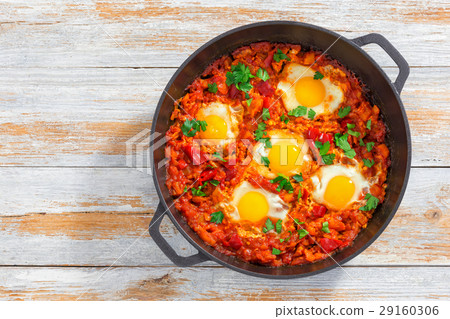 shakshuka - fried eggs, onion, bell peppe 29160306