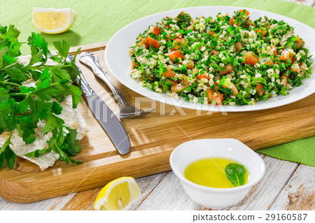 Tabbouleh parsley salad on white platter  29160587