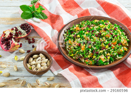 salad with pomegranate, pistachio 29160596