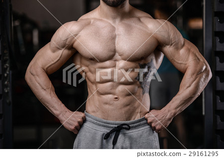 Handsome fitness model train in gym gain muscle 29161295