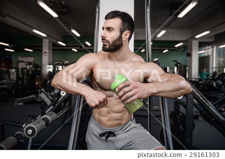 Handsome fitness model train in gym gain muscle 29161303