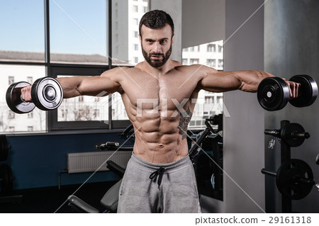 Handsome fitness model train in gym gain muscle 29161318