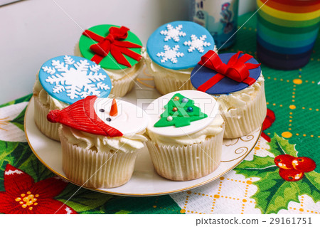 New Year's capcakes on a plate 29161751