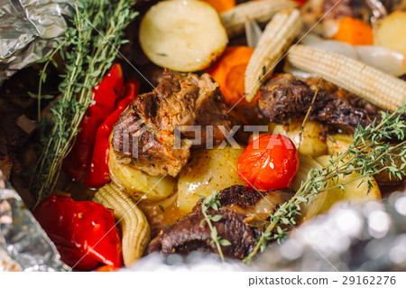 Fried potato with herbs, rosemary, small corn cobs 29162276