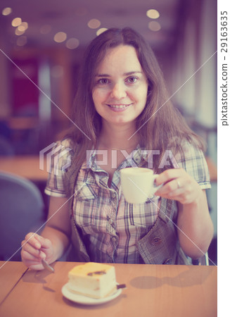 Adult girl drinking morning coffee 29163635