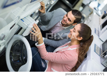 salesman and customer in store salesman and customer in store 29163771