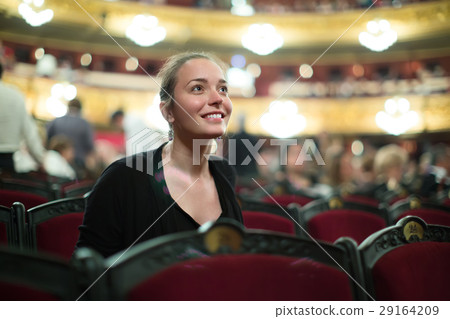 Portrait of woman in auditorium of theatre . 29164209