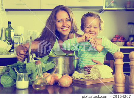 Happy family cooking soup Happy family cooking soup 29164267