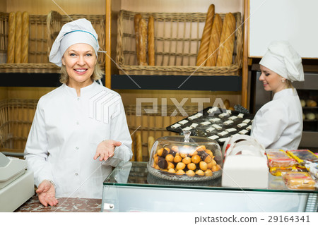 Two female bakers in bakery. 29164341
