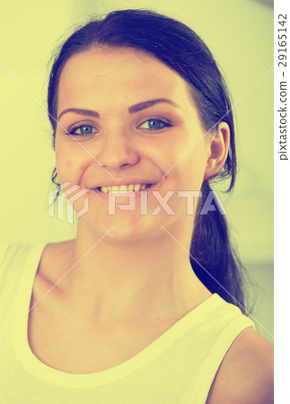 Young brunette woman in white 29165142