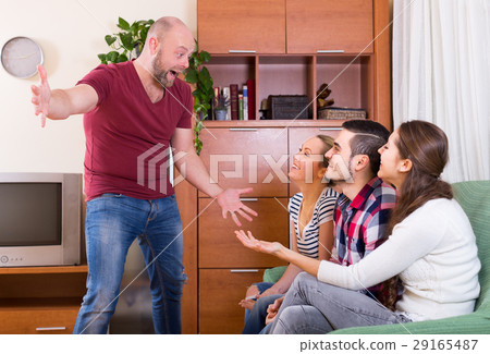 adults playing charades adults playing charades 29165487
