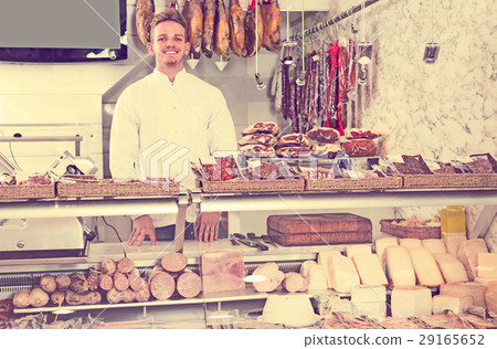 cheerful young seller at butcher market 29165652