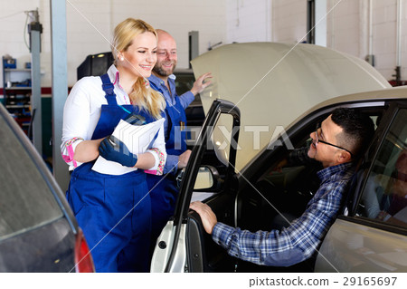 Service crew and driver near car Service crew and driver near car 29165697