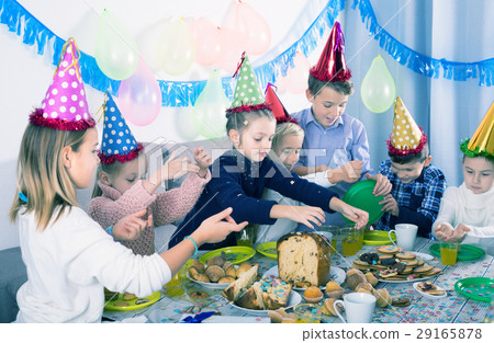 Children having birthday dinner Children having birthday dinner 29165878