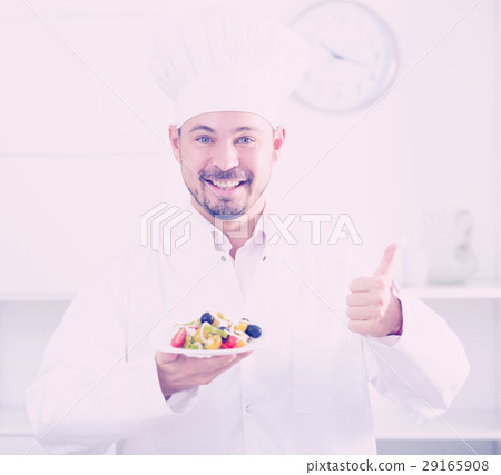 Positive cook with greek salad 29165908