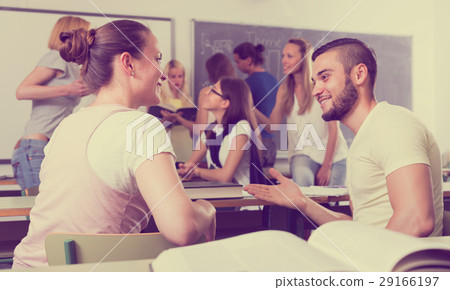 students chatting while sitting in the room students chatting while sitting in the room 29166197