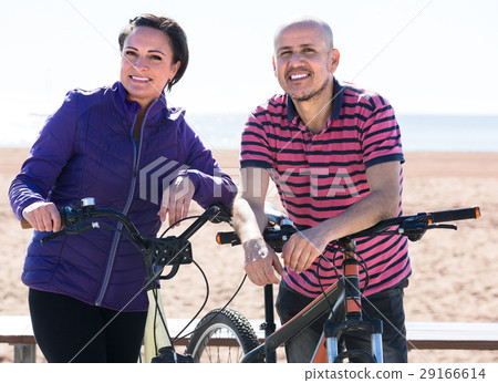 Mature couple with bicycles Mature couple with bicycles 29166614