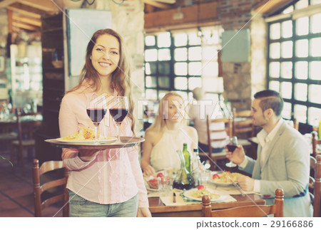 Portrait young female waiter 29166886